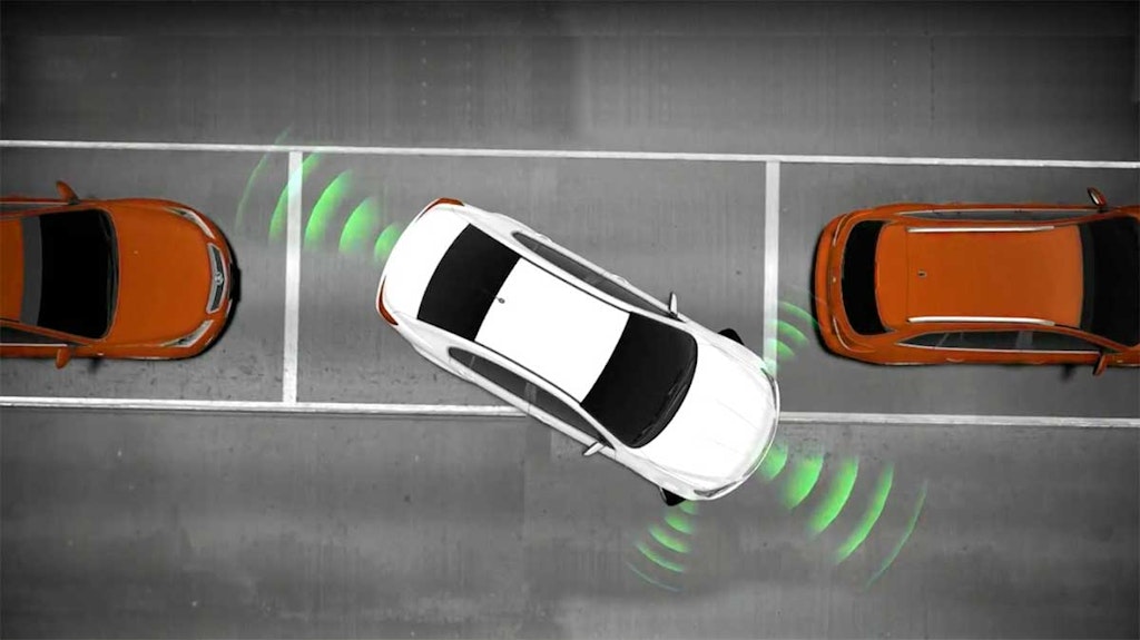 Using sonar to sense objects behind a vehicle